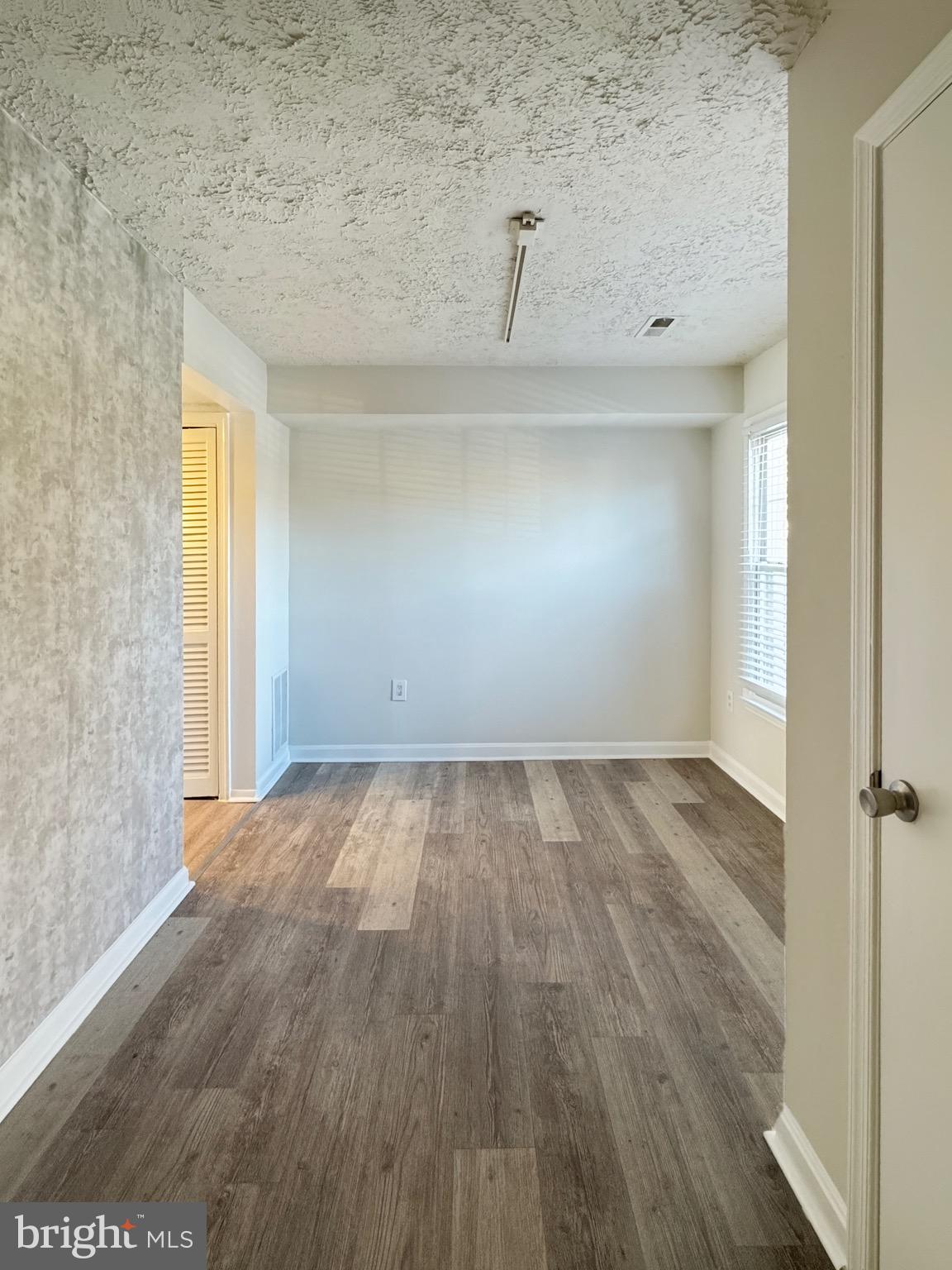 3773 Port Hope Point Triangle, VA 22172 - Photo 7 of 15 a view of a room with wooden floor and a sink