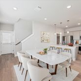 a view of kitchen with cabinets and wooden floor