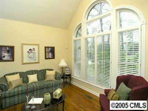 7620 Ridgefield Drive Charlotte, NC 28269 - Photo 2 of 8 a living room with furniture and a large window