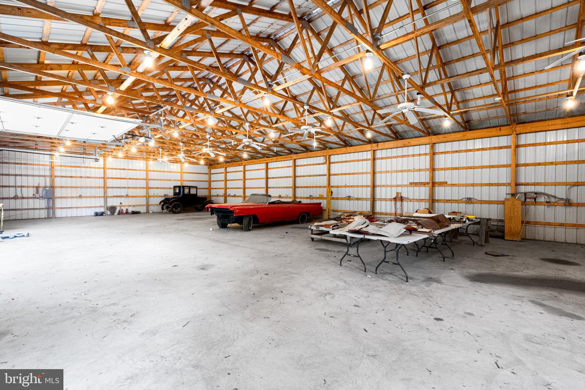 18189 Sands Road Purcellville, VA 20132 - Photo 87 of 145 Inside of 2 bay pole barn.