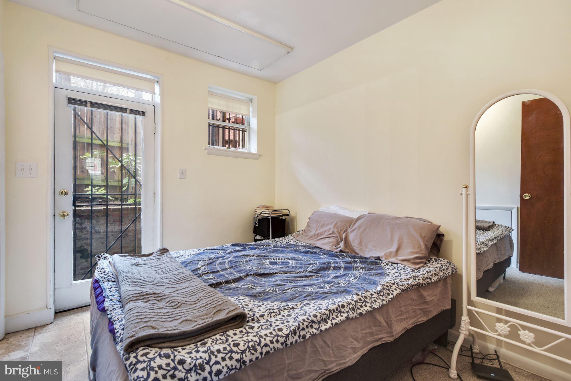 508 3rd Street Northeast Washington, DC 20002 - Photo 21 of 25 Lower level bedroom with patio access
