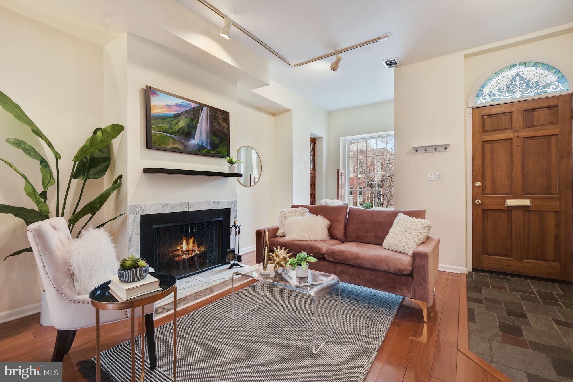 508 3rd Street Northeast Washington, DC 20002 - Photo 4 of 25 Upper level open living space with wood burning FP
