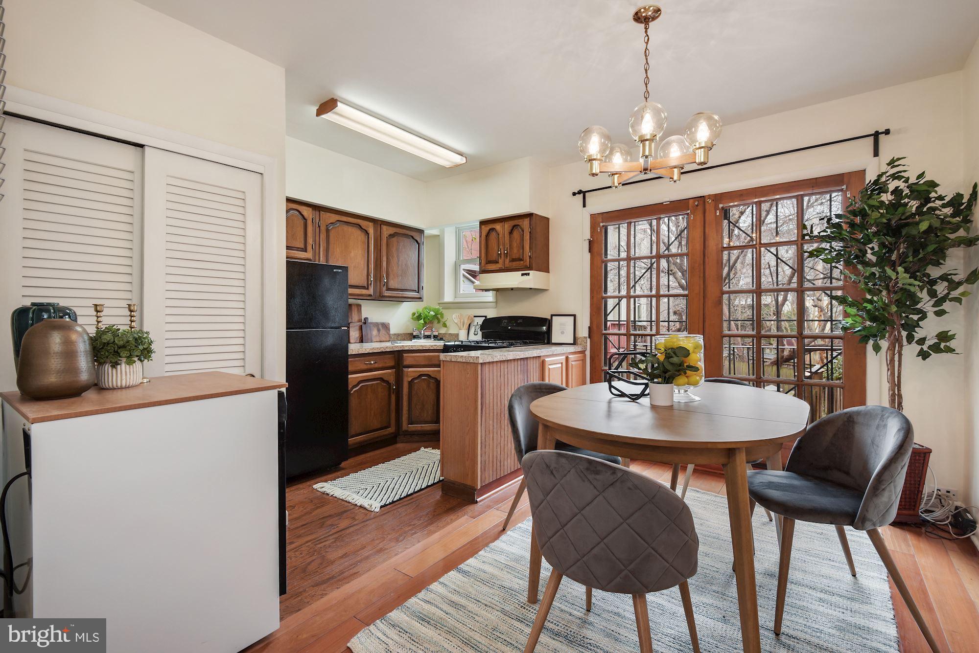 508 3rd Street Northeast Washington, DC 20002 - Photo 9 of 25 The dining area opens to the efficient kitchen