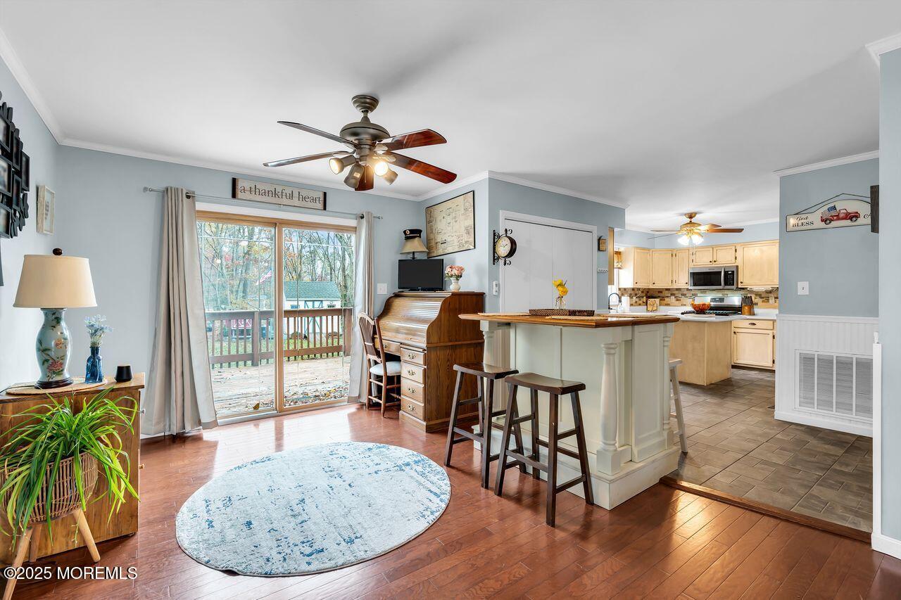 1300 Maxim Southard Road Howell, NJ 07731 - Photo 23 of 61 a view of a dining room with furniture window and wooden floor