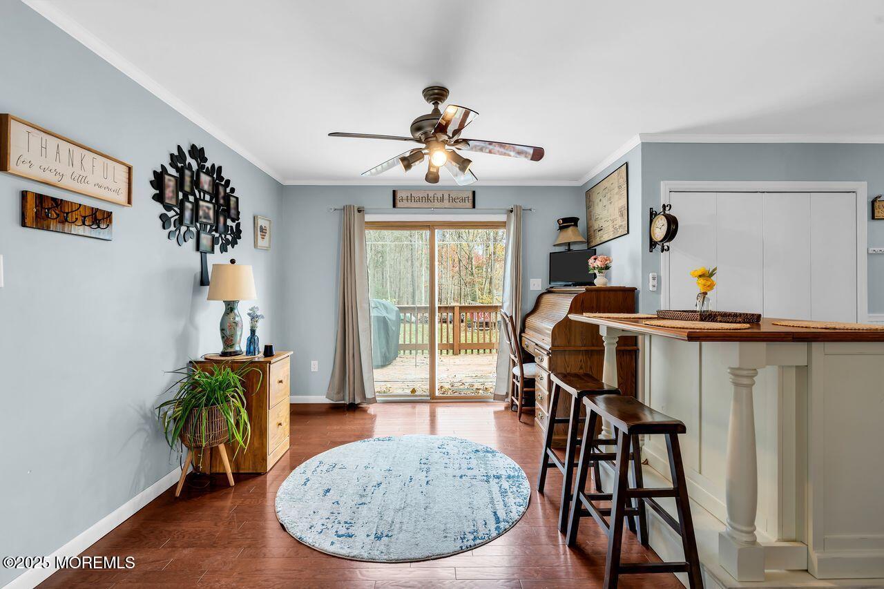 1300 Maxim Southard Road Howell, NJ 07731 - Photo 24 of 61 a view of a dining room with furniture and wooden floor