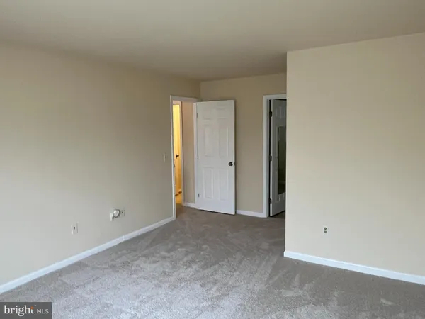 an empty room with an entryway