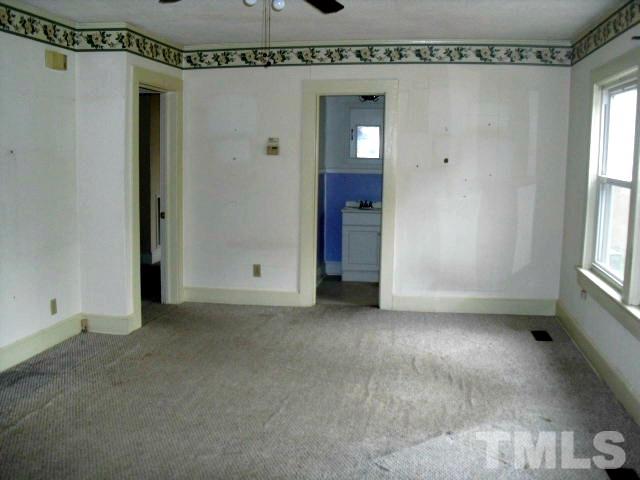 2509 Ross Road Durham, NC 27703 - Photo 11 of 24 an empty room with windows