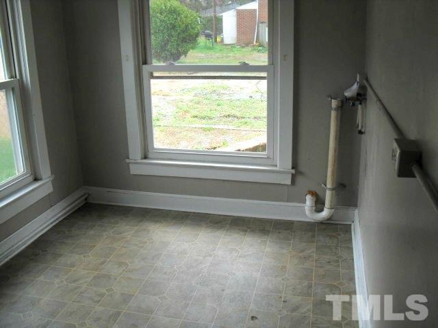 2509 Ross Road Durham, NC 27703 - Photo 13 of 24 a view of a room that has a window in it