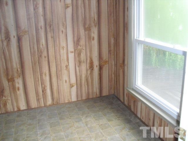 2509 Ross Road Durham, NC 27703 - Photo 14 of 24 a view of an empty room with a window