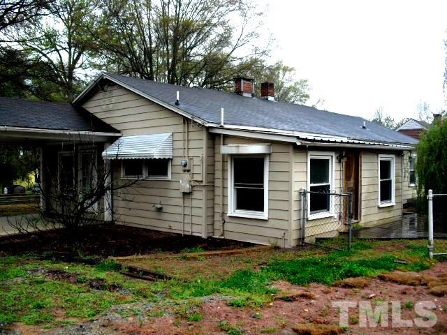 2509 Ross Road Durham, NC 27703 - Photo 2 of 24 a front view of a house with garden