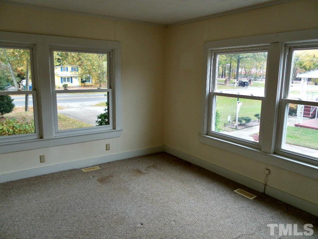 2509 Ross Road Durham, NC 27703 - Photo 22 of 24 an empty room with windows