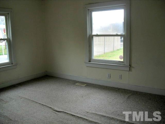 2509 Ross Road Durham, NC 27703 - Photo 8 of 24 an empty room with a window