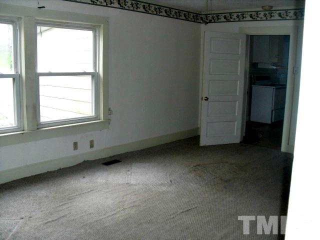 2509 Ross Road Durham, NC 27703 - Photo 10 of 24 an empty room with a window