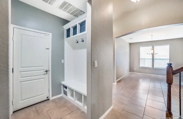 a view of livingroom with furniture and cabinet
