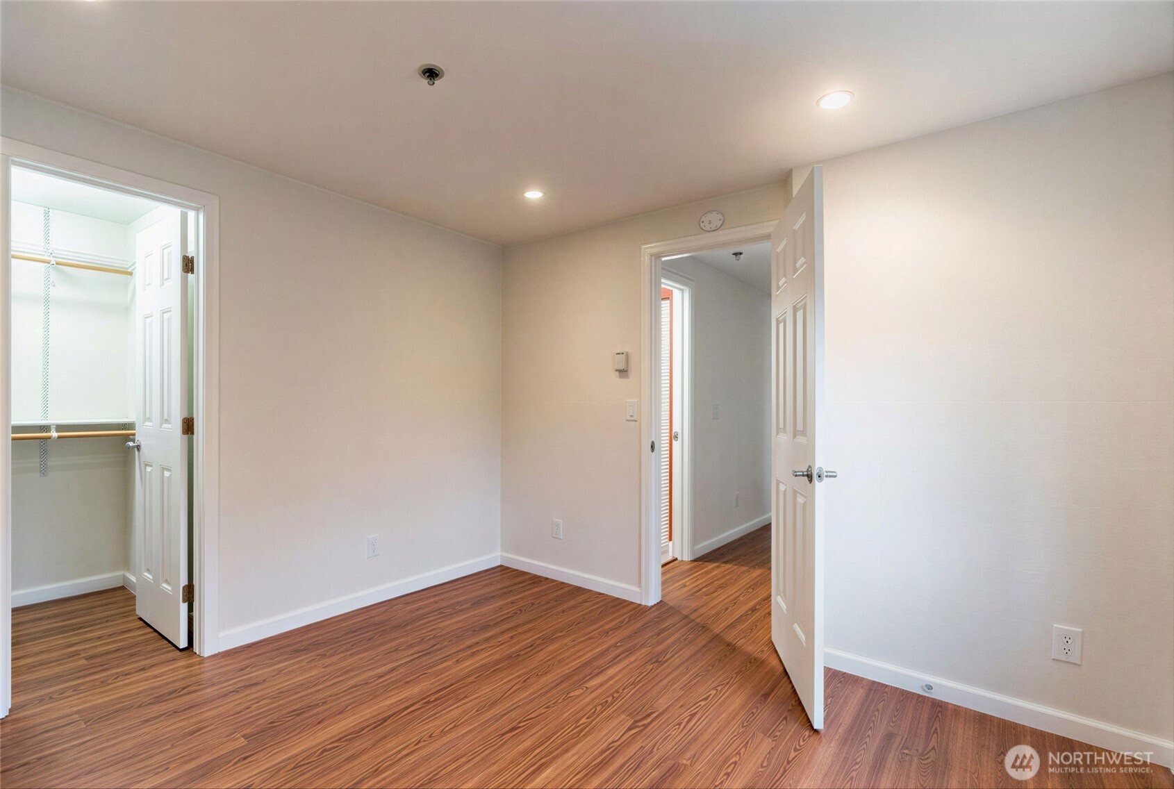 975 Aberdeen Avenue Northeast, Unit F207 Renton, WA 98056 - Photo 18 of 24 a view of an empty room with wooden floor