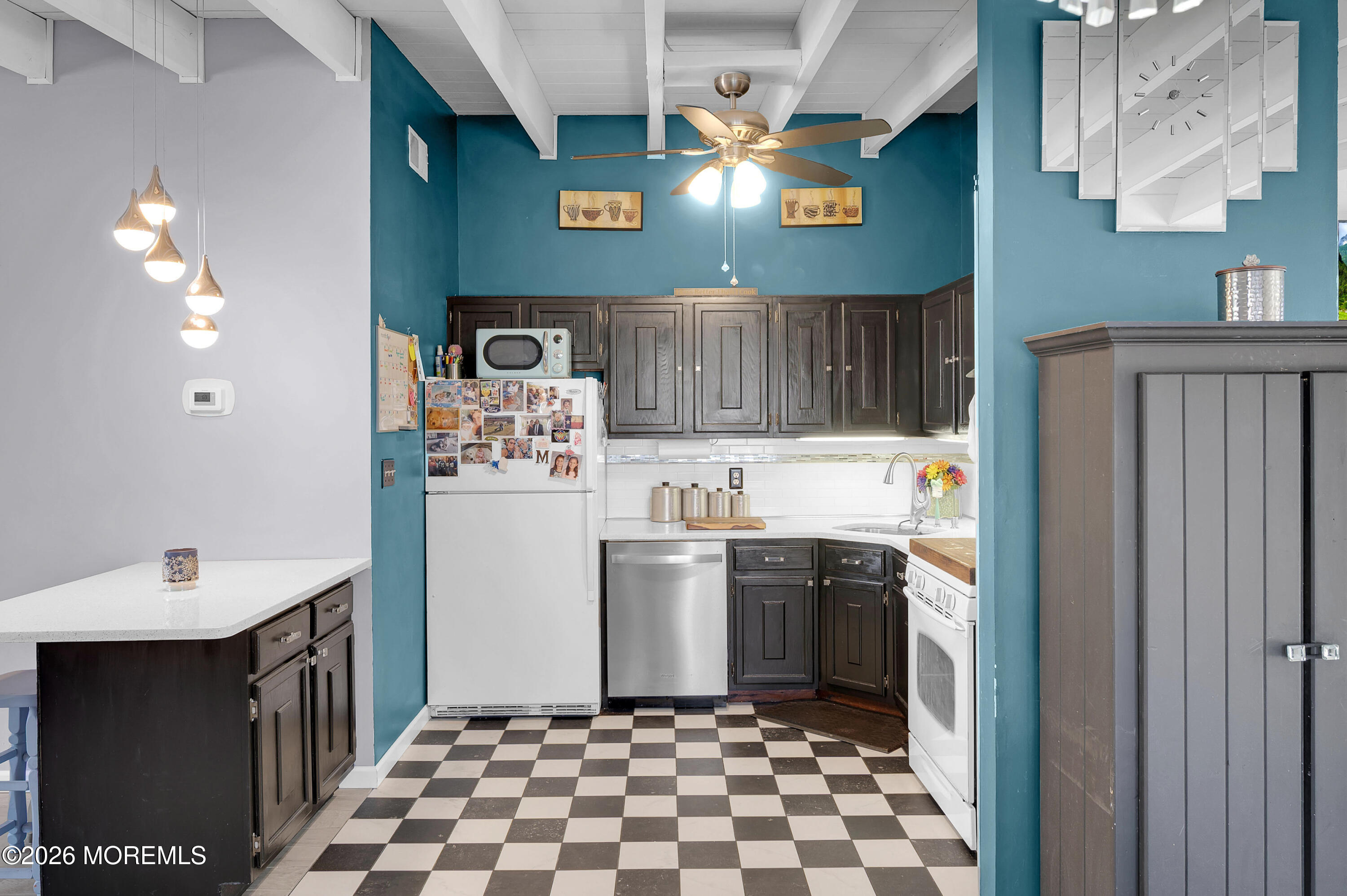 715 Tampa Road Forked River, NJ 08731 - Photo 11 of 44 a kitchen with stainless steel appliances granite countertop a refrigerator and a sink