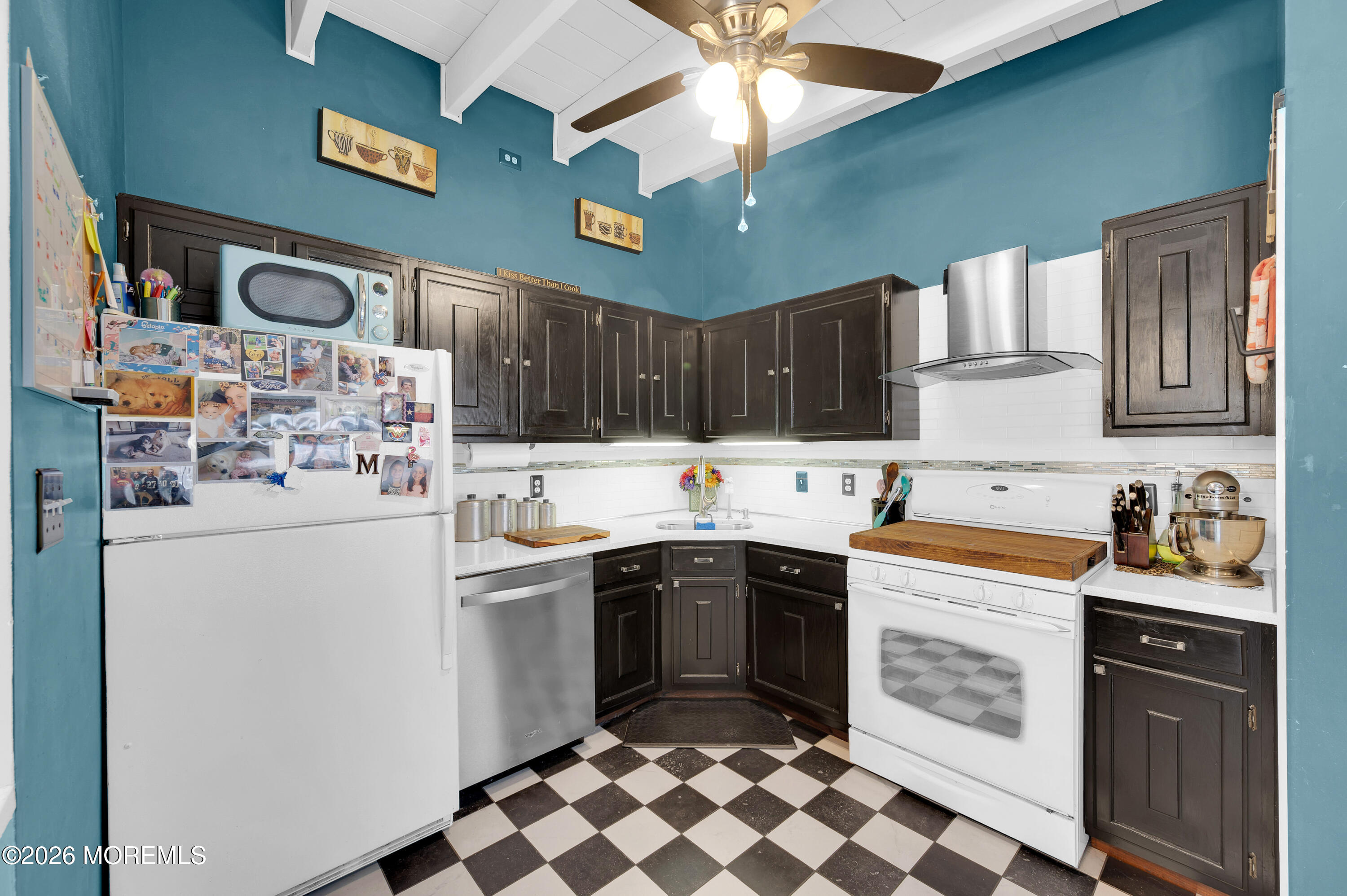 715 Tampa Road Forked River, NJ 08731 - Photo 12 of 44 a kitchen with stainless steel appliances granite countertop a sink and cabinets