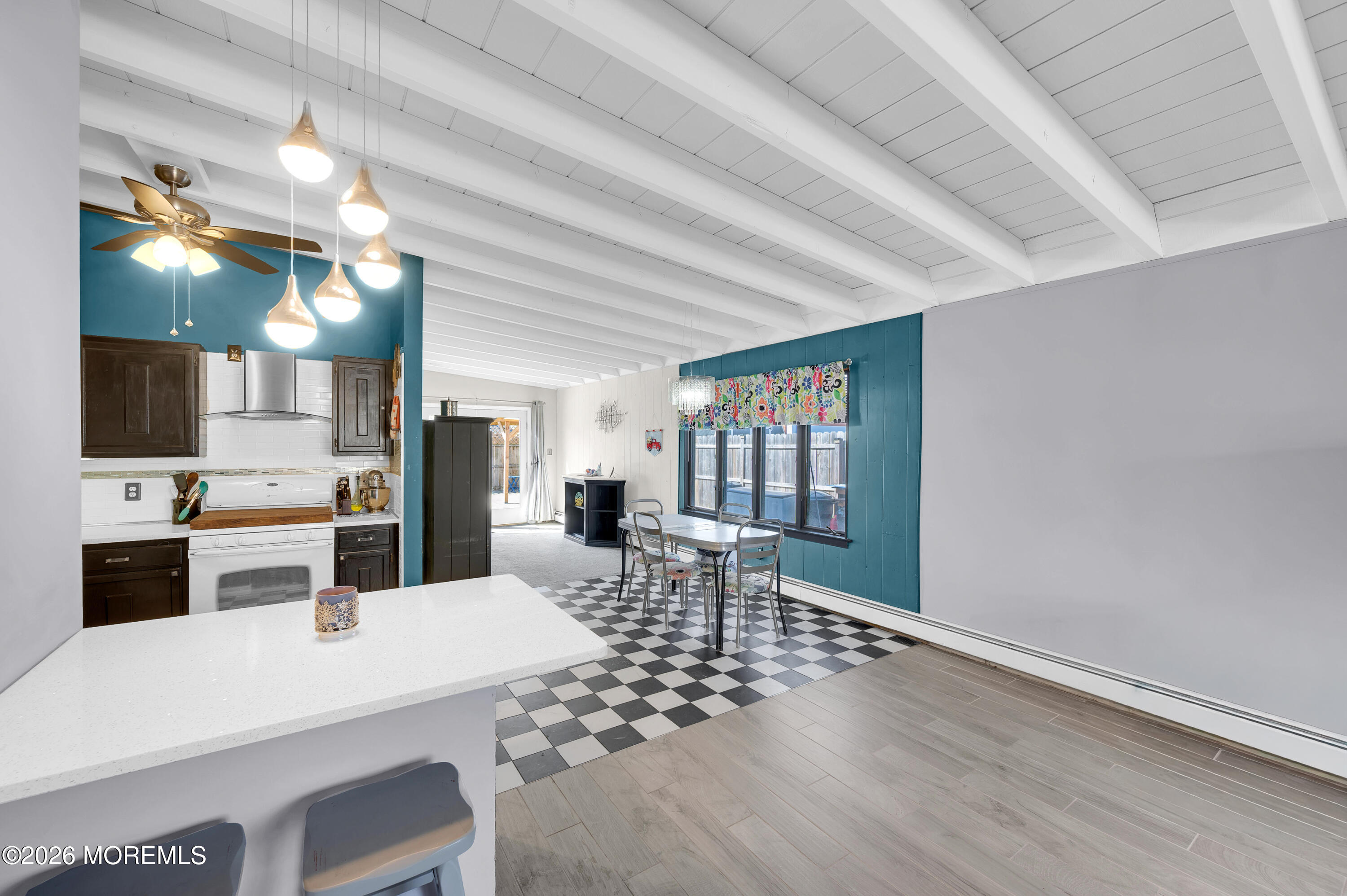 715 Tampa Road Forked River, NJ 08731 - Photo 15 of 44 a view of a dining room with furniture and wooden floor