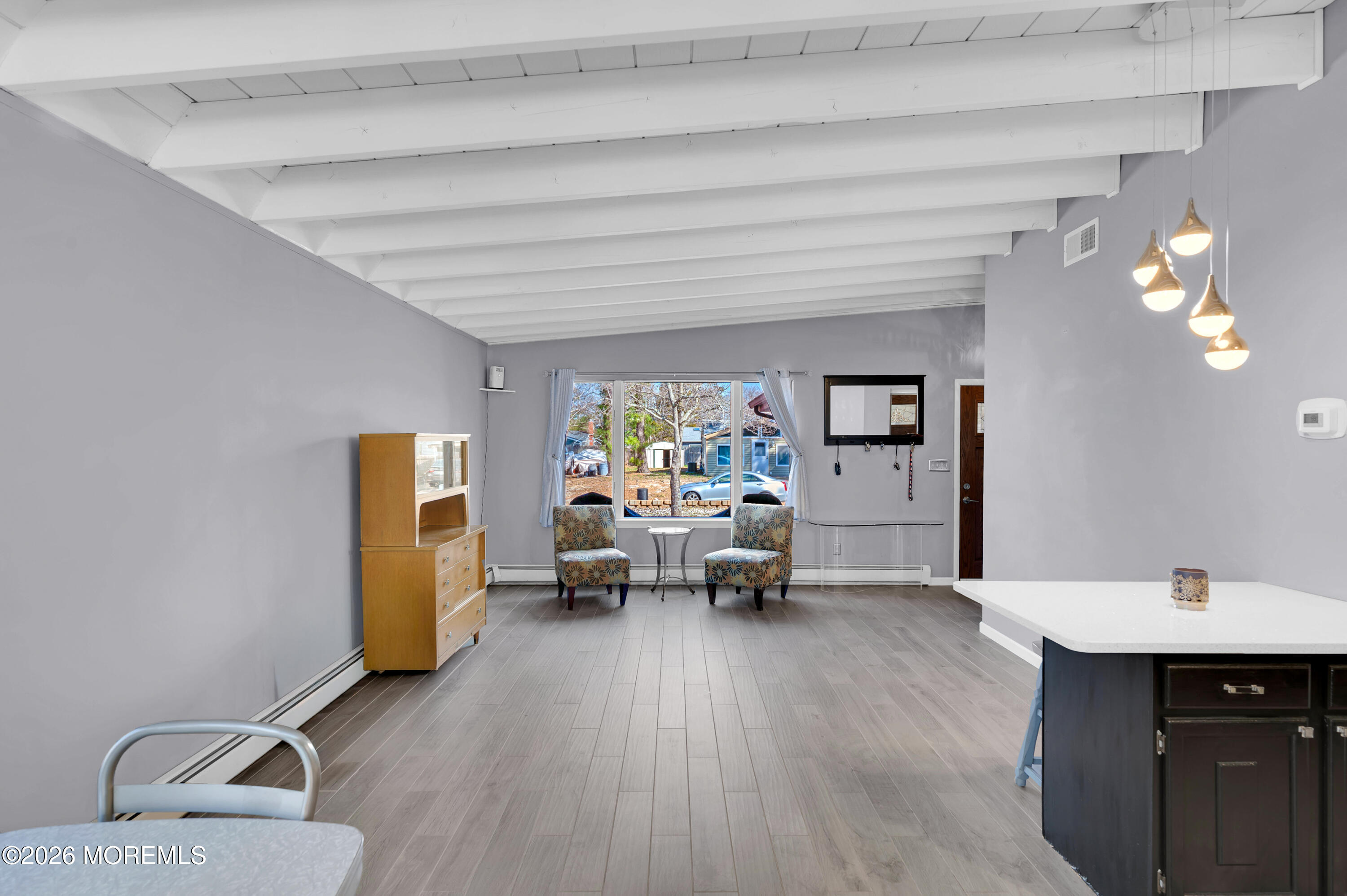 715 Tampa Road Forked River, NJ 08731 - Photo 19 of 44 a living room with furniture and a wooden floor