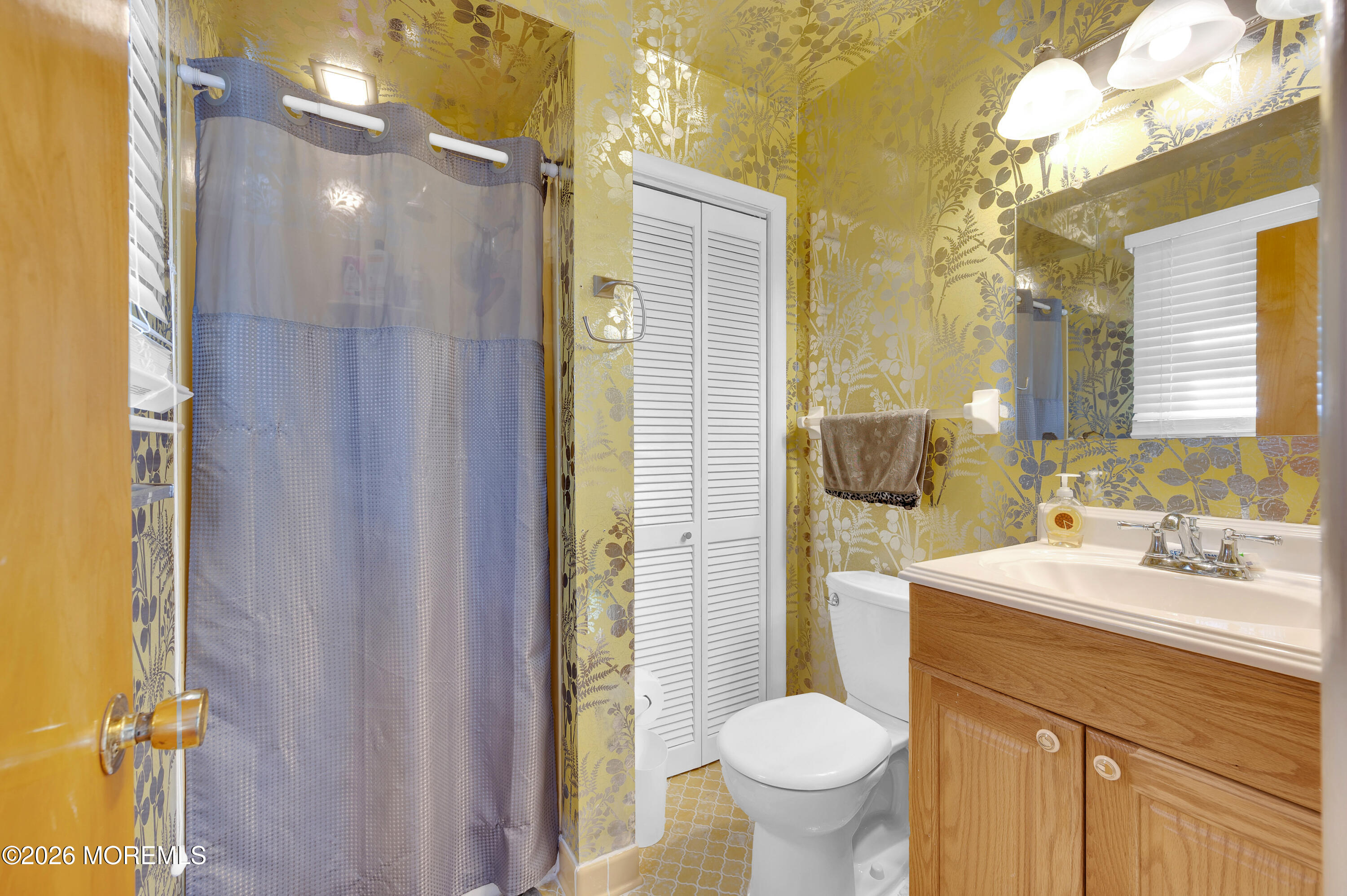 715 Tampa Road Forked River, NJ 08731 - Photo 23 of 44 a bathroom with a sink toilet and shower