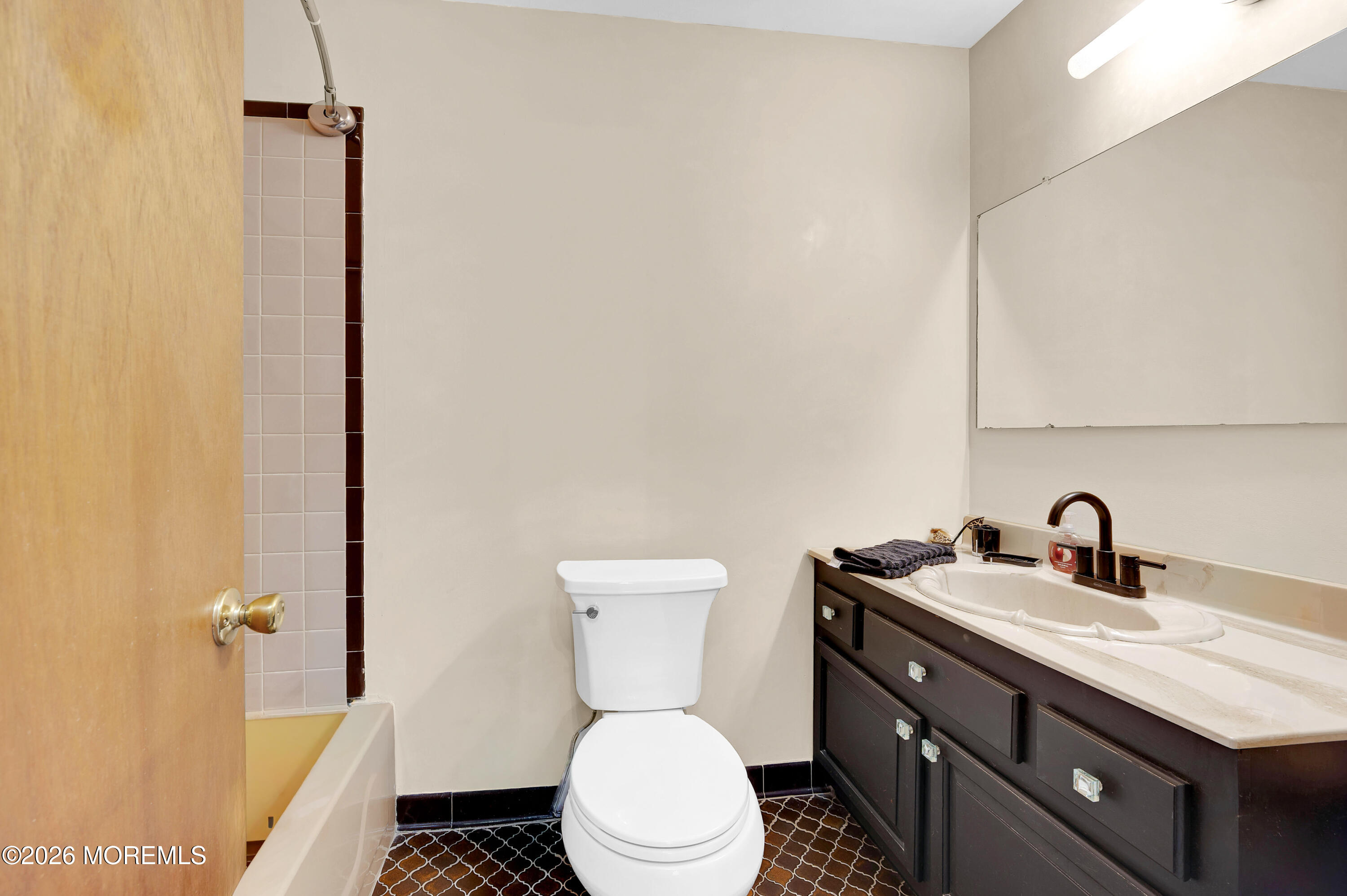 715 Tampa Road Forked River, NJ 08731 - Photo 26 of 44 a bathroom with a sink a toilet and shower