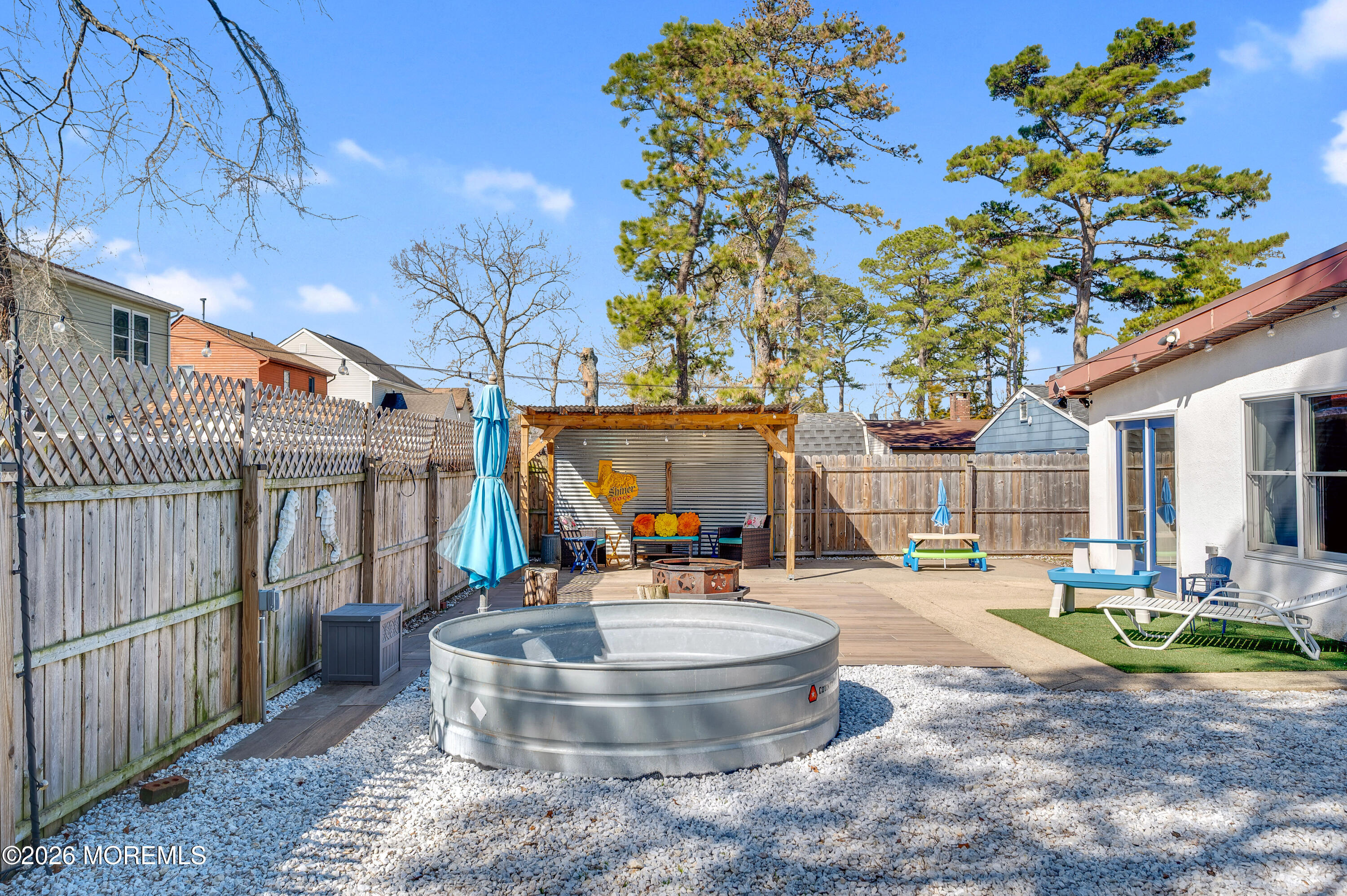 715 Tampa Road Forked River, NJ 08731 - Photo 28 of 44 a view of a house with backyard and sitting area