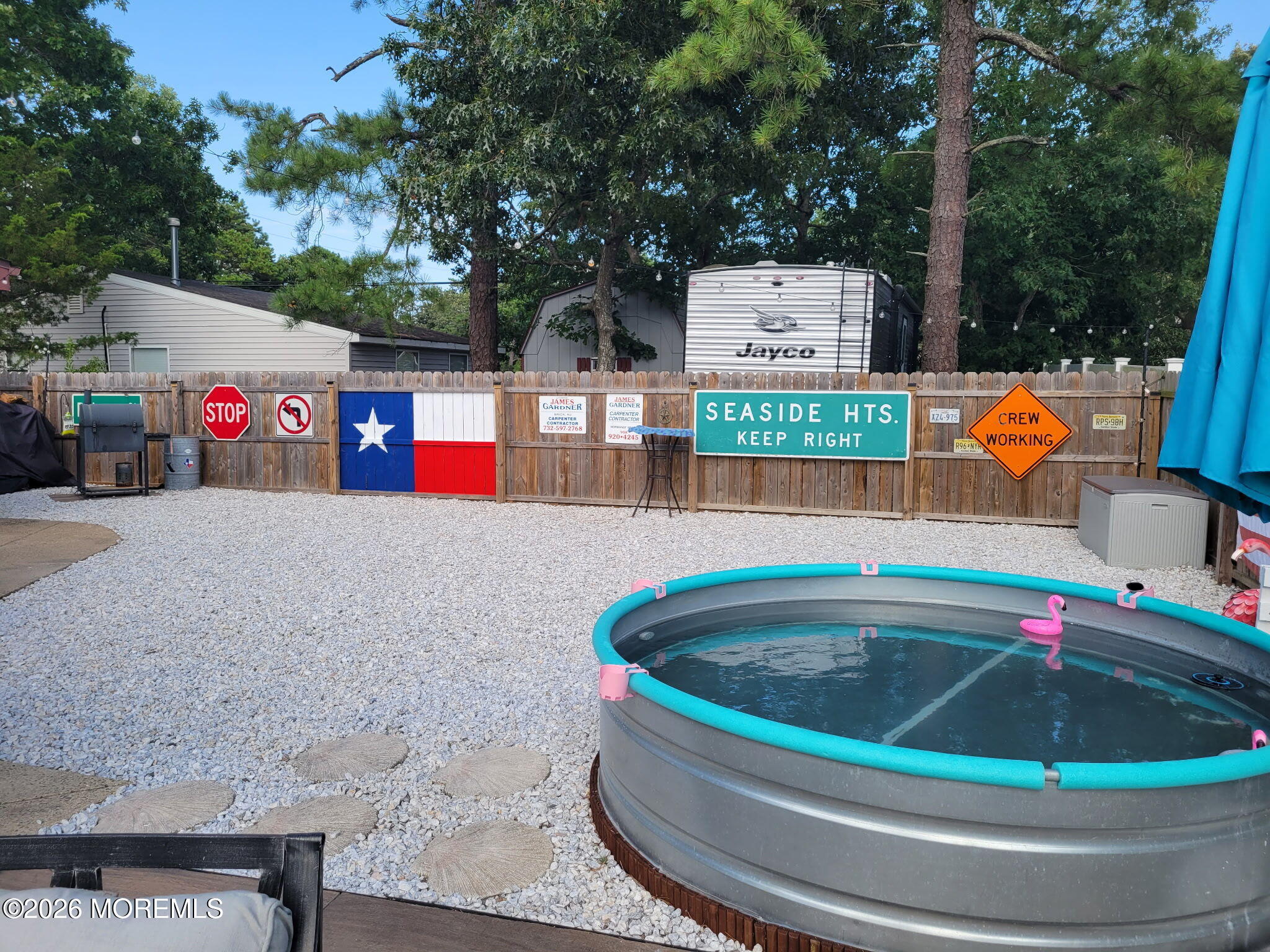 715 Tampa Road Forked River, NJ 08731 - Photo 30 of 44 a view of outdoor space with swimming pool