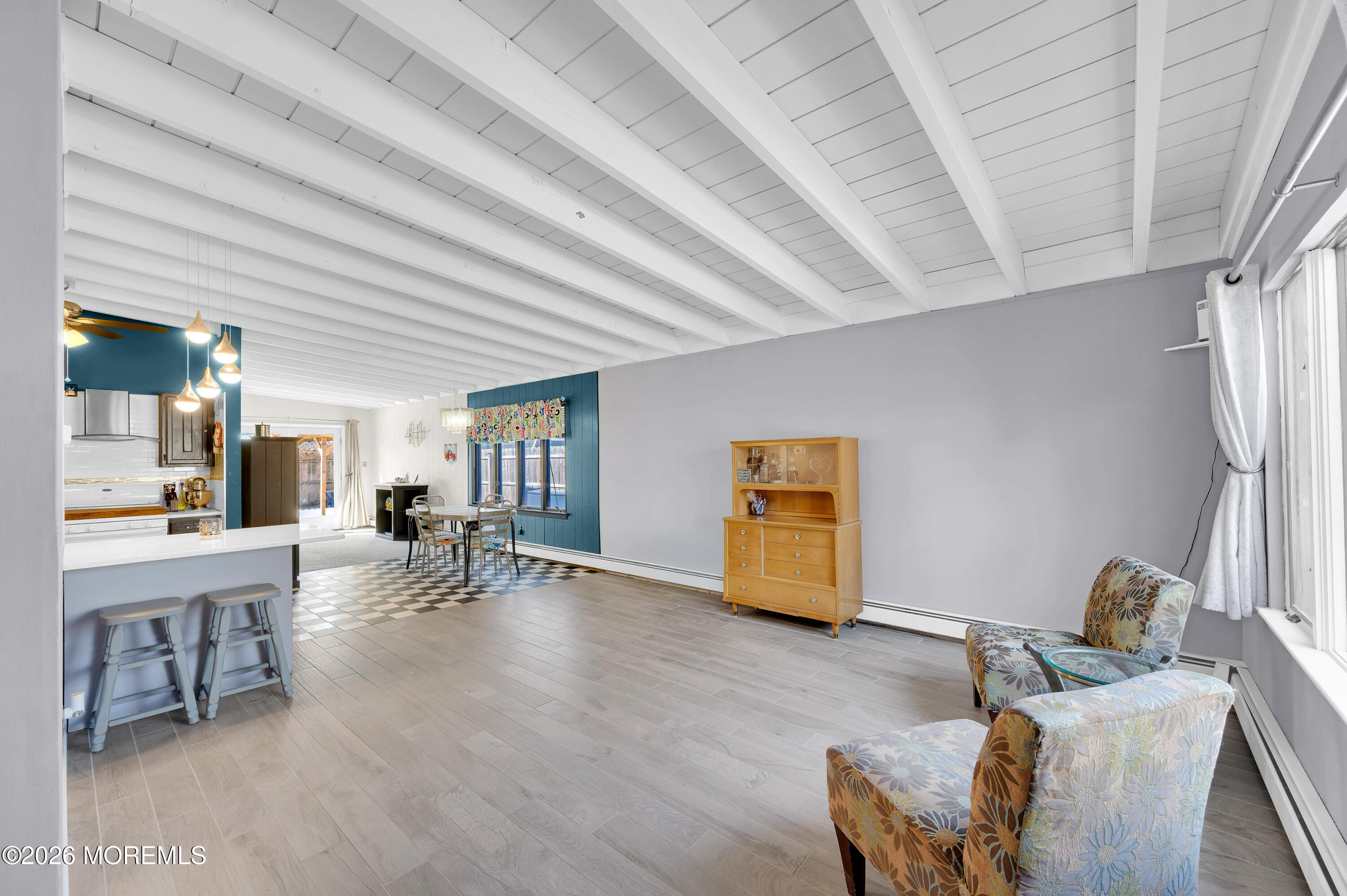 715 Tampa Road Forked River, NJ 08731 - Photo 3 of 44 a living room with furniture and a table
