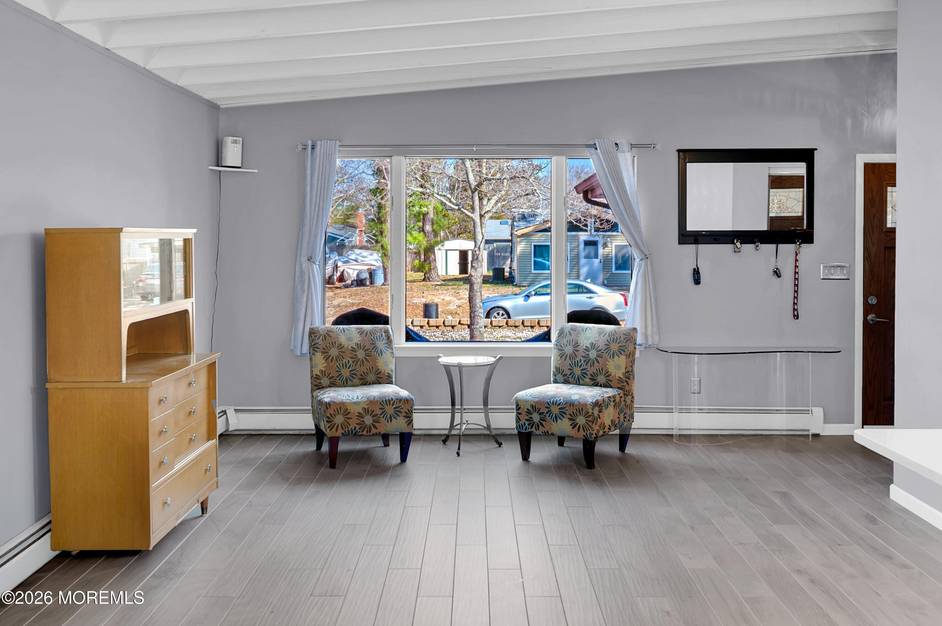 715 Tampa Road Forked River, NJ 08731 - Photo 4 of 44 a living room with furniture and a large window