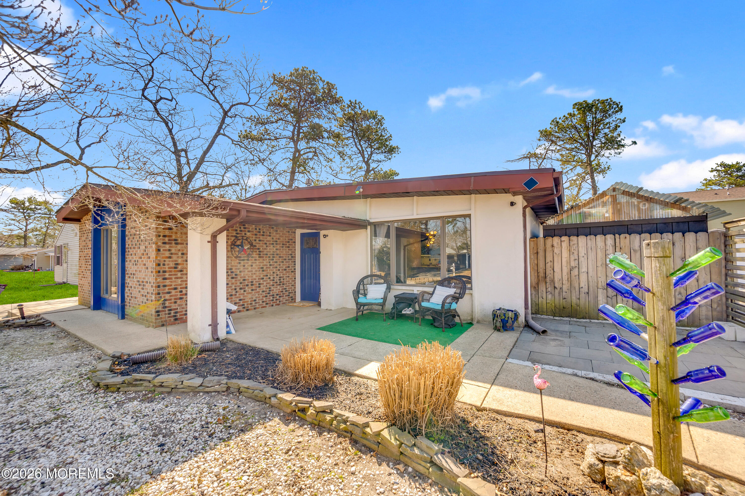 715 Tampa Road Forked River, NJ 08731 - Photo 43 of 44 a view of a house with garden and sitting area
