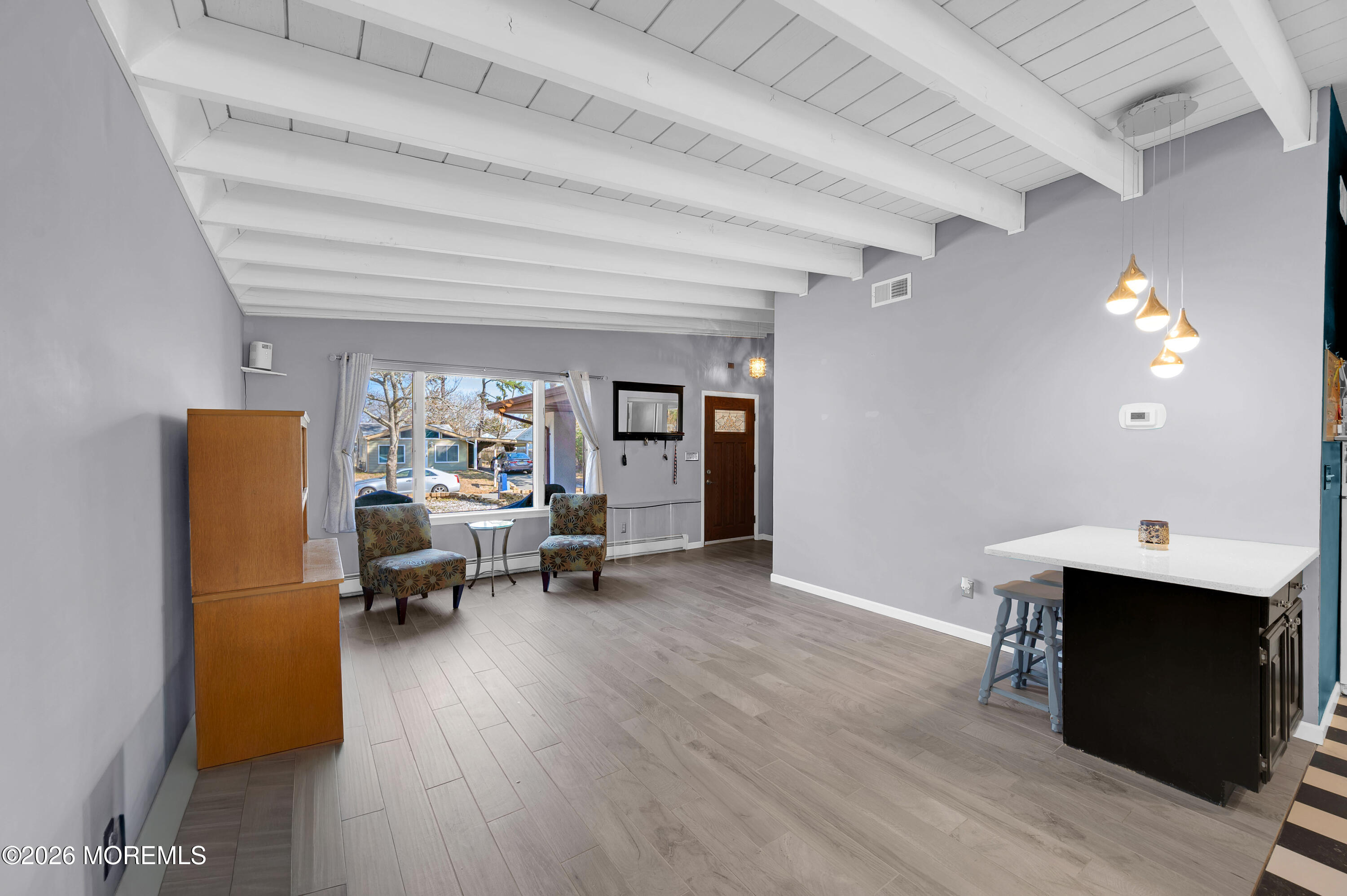 715 Tampa Road Forked River, NJ 08731 - Photo 5 of 44 a view of a workspace with furniture and a wooden floor