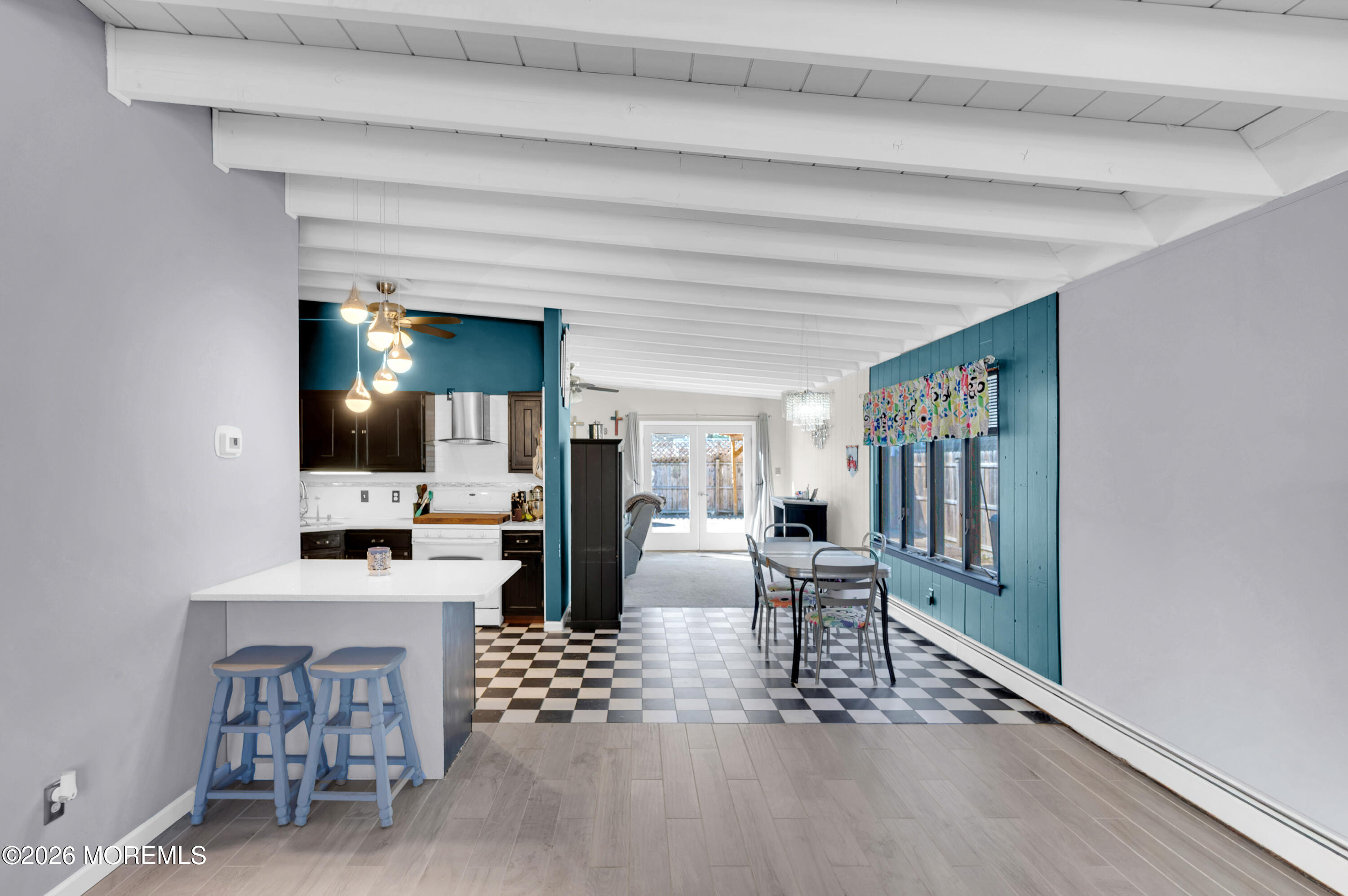 715 Tampa Road Forked River, NJ 08731 - Photo 7 of 44 a living room with furniture a flat screen tv and large window