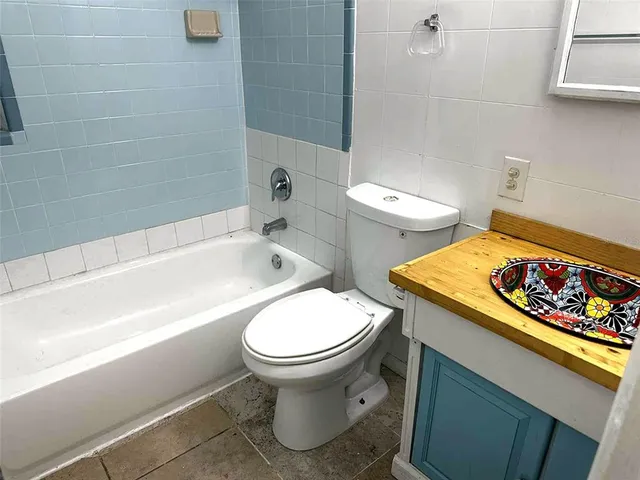 a bathroom with a sink and a toilet