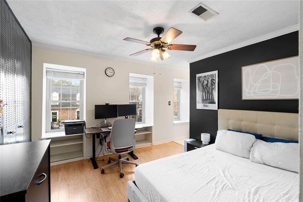 5 Spinning House Place Northwest Atlanta, GA 30318 - Photo 16 of 42 a bedroom with a workspace