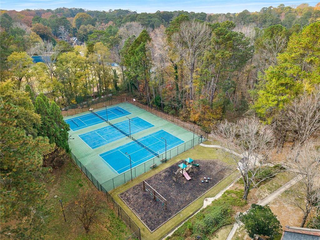 5 Spinning House Place Northwest Atlanta, GA 30318 - Photo 41 of 42 a view of a tennis ground with large trees