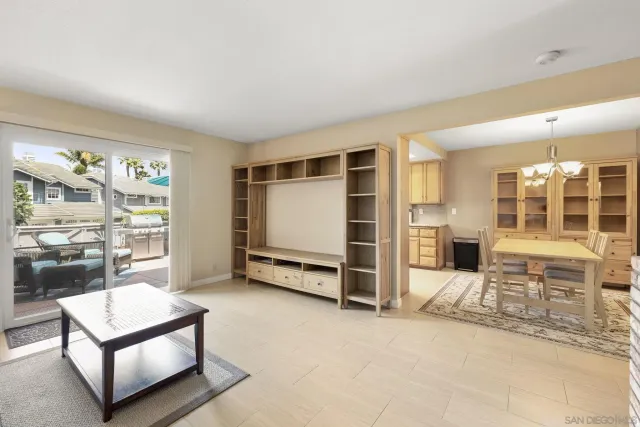 a view of a living room and kitchen view