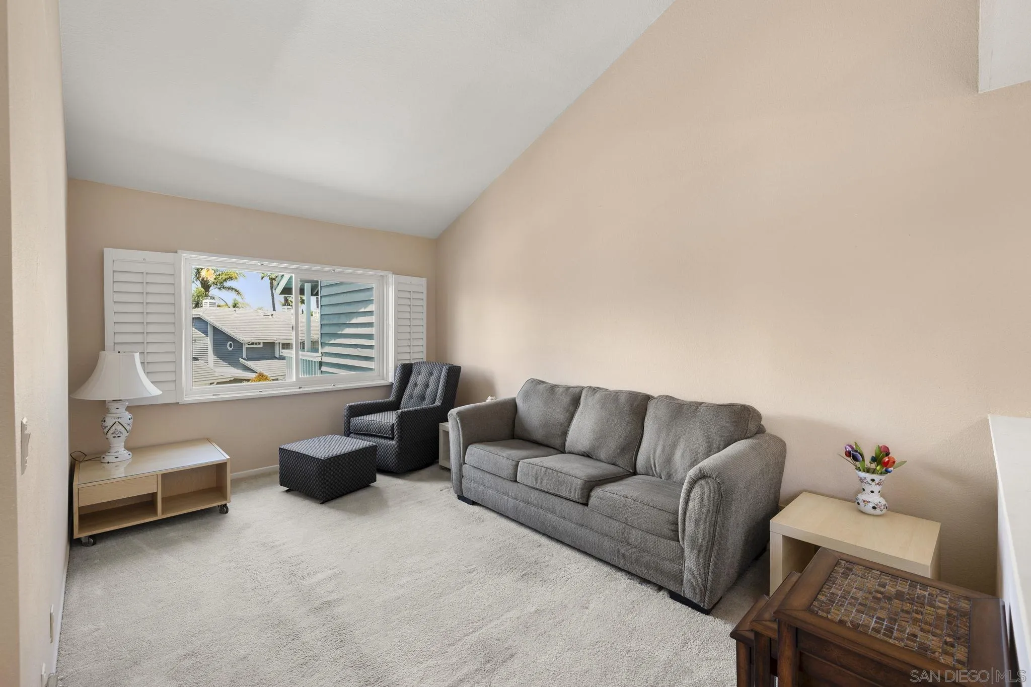 677 Summer View Circle Encinitas, CA 92024 - Photo 19 of 58 a living room with furniture and a window