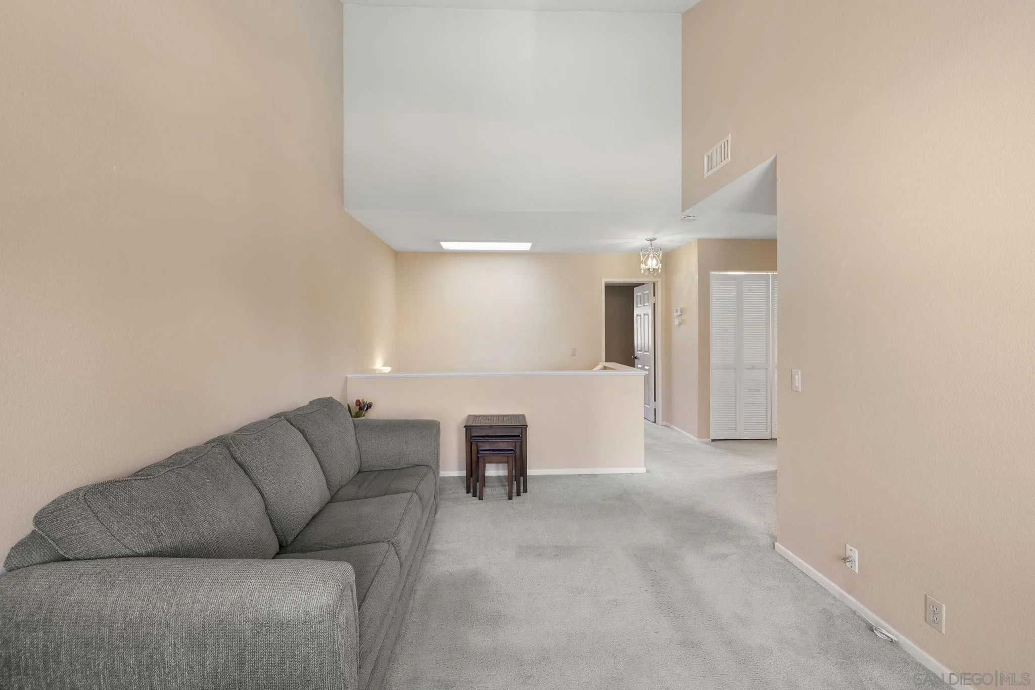 677 Summer View Circle Encinitas, CA 92024 - Photo 20 of 58 a living room with furniture and a couch