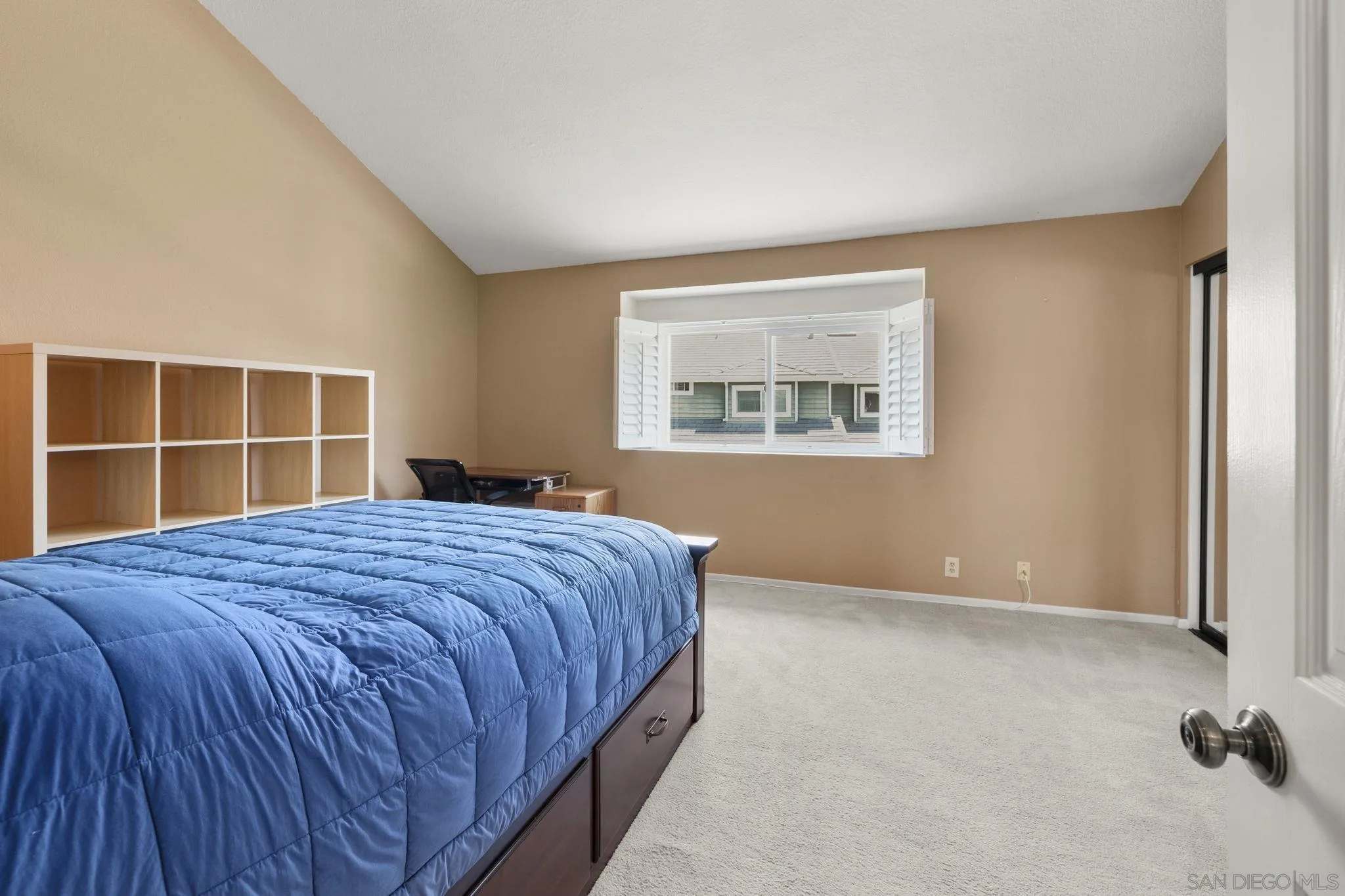 677 Summer View Circle Encinitas, CA 92024 - Photo 26 of 58 a bedroom with a bed and a window