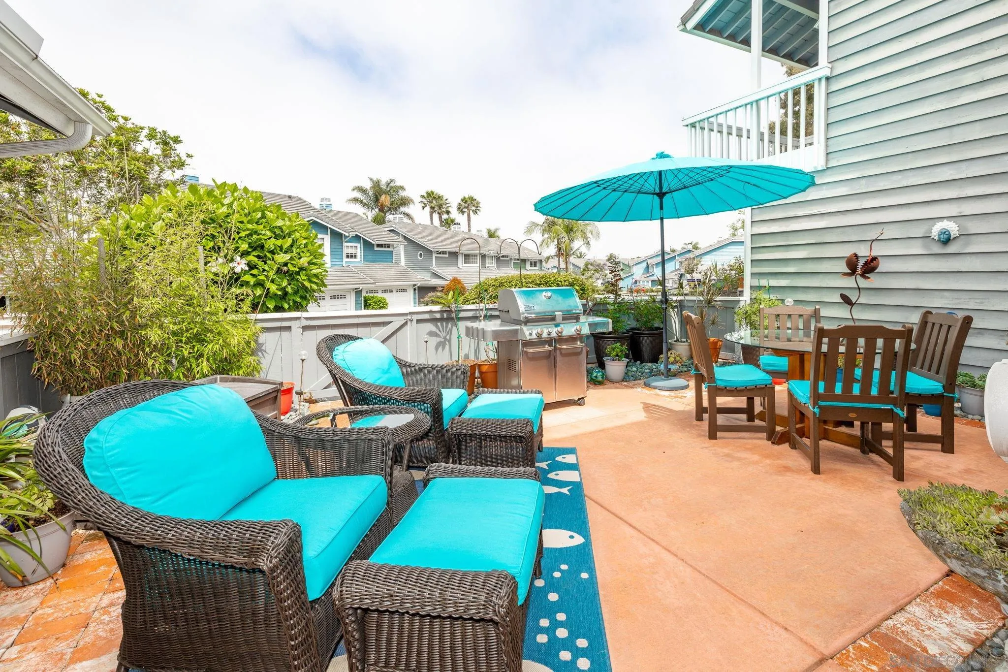 677 Summer View Circle Encinitas, CA 92024 - Photo 30 of 58 a view of a chairs and table in backyard
