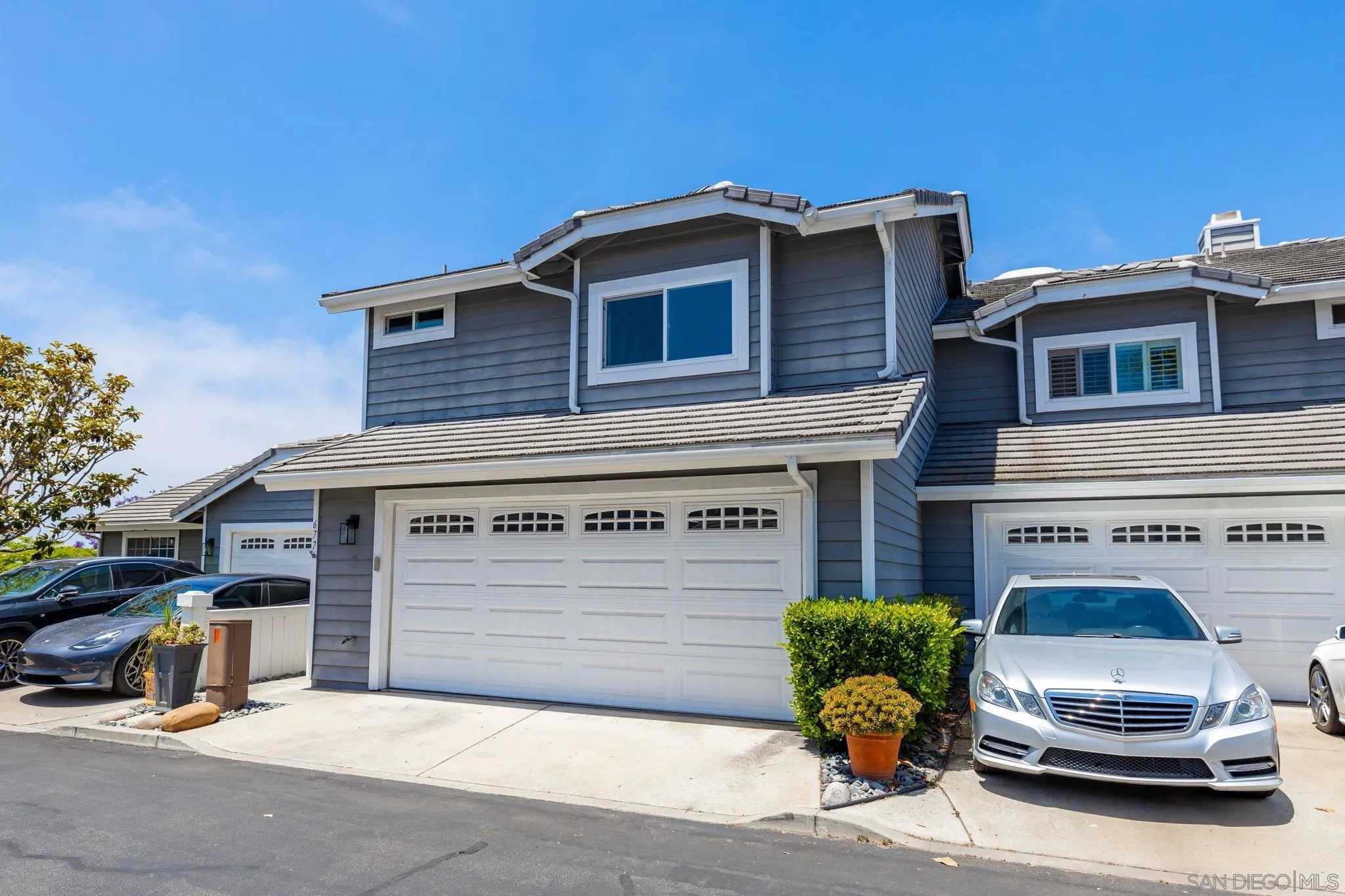 677 Summer View Circle Encinitas, CA 92024 - Photo 3 of 58 a car parked in front of house