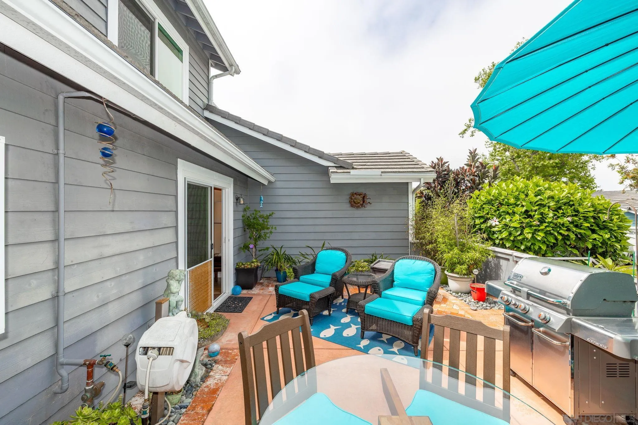 677 Summer View Circle Encinitas, CA 92024 - Photo 32 of 58 a view of a chairs and table in a patio