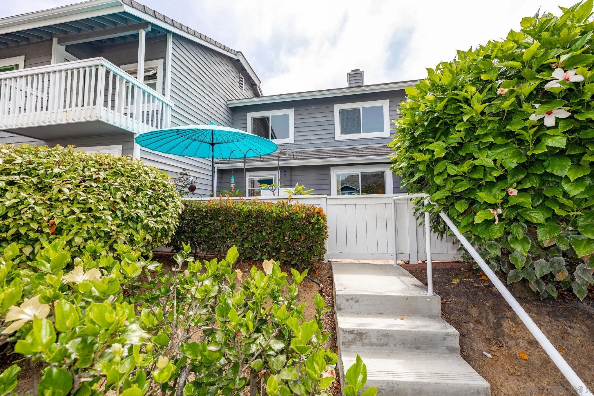 677 Summer View Circle Encinitas, CA 92024 - Photo 35 of 58 a front view of a house with a yard