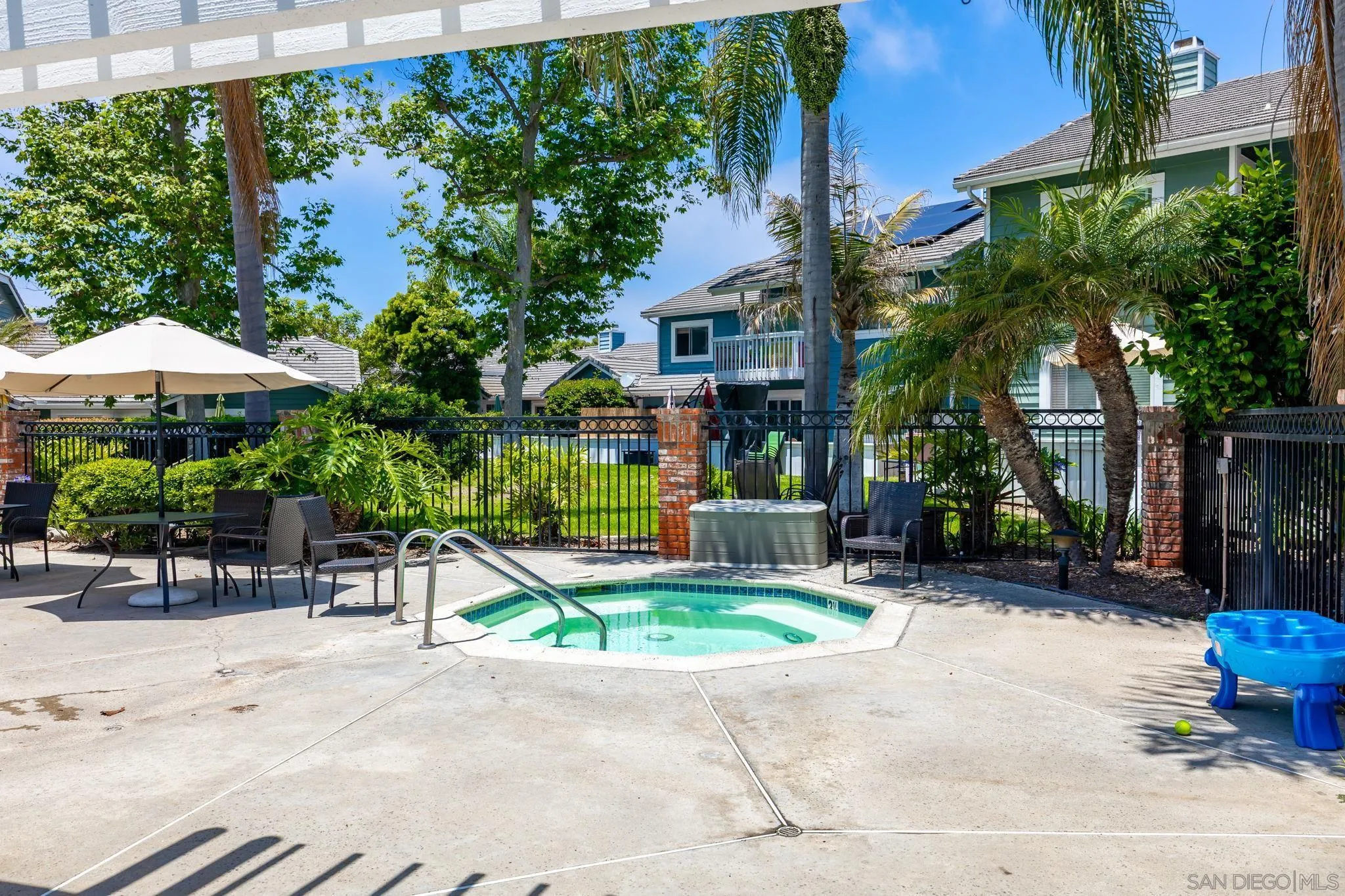 677 Summer View Circle Encinitas, CA 92024 - Photo 38 of 58 a view of a chair and table in backyard