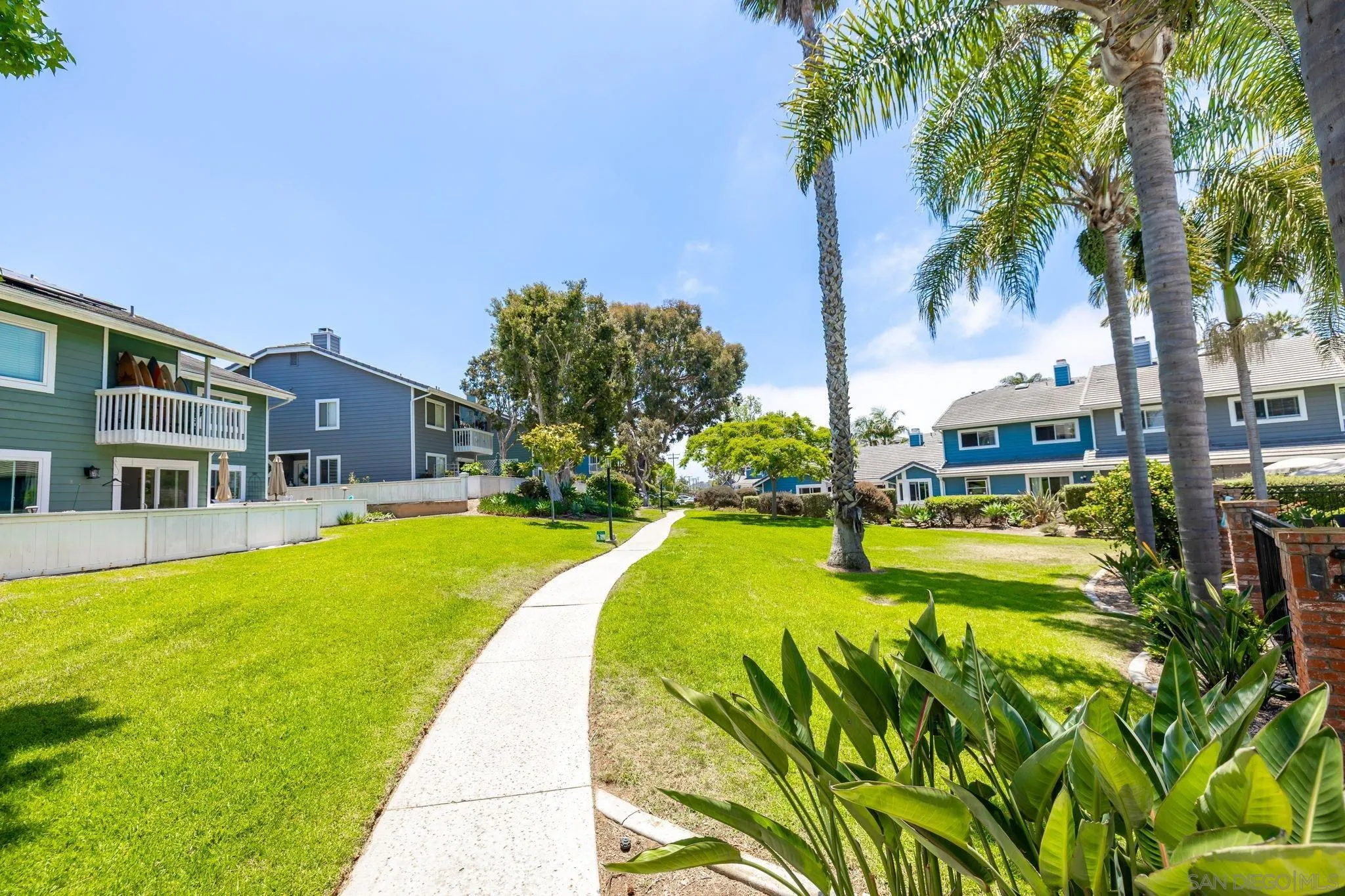 677 Summer View Circle Encinitas, CA 92024 - Photo 42 of 58 a swimming pool with outdoor seating and yard