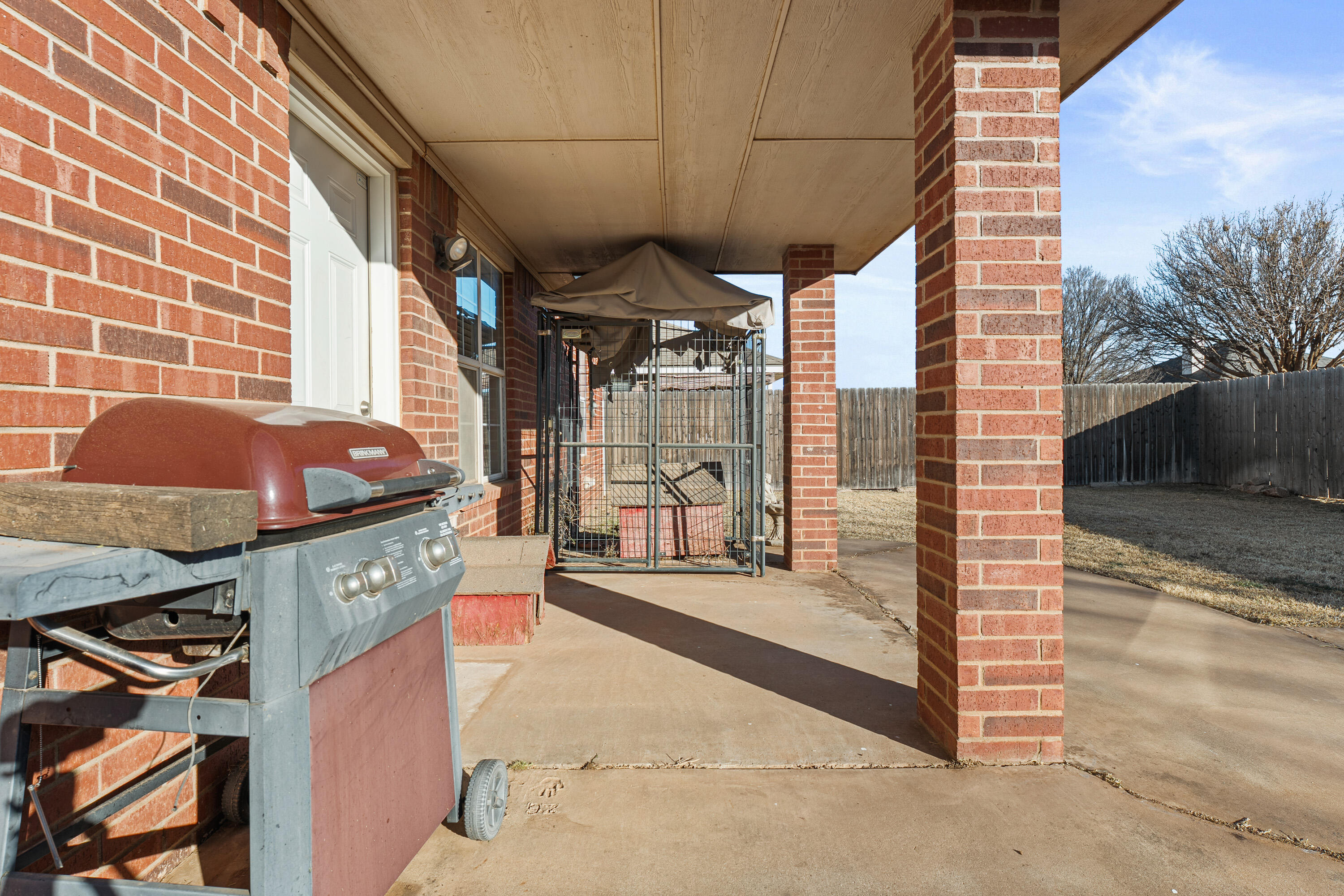 1701 79th Street Lubbock, TX 79423 - Photo 24 of 26 a balcony view with a glass door