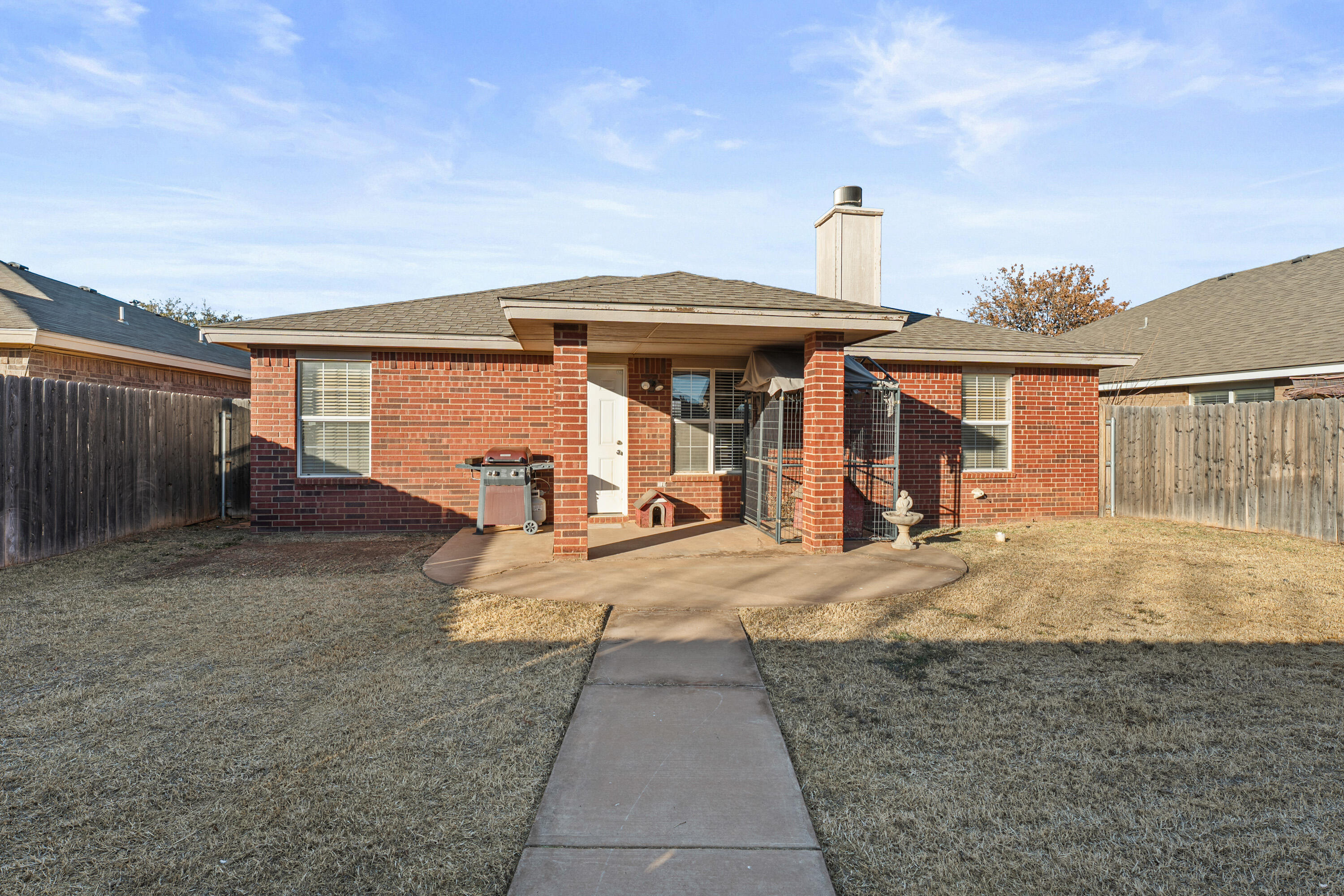 1701 79th Street Lubbock, TX 79423 - Photo 26 of 26 a view of a house with backyard