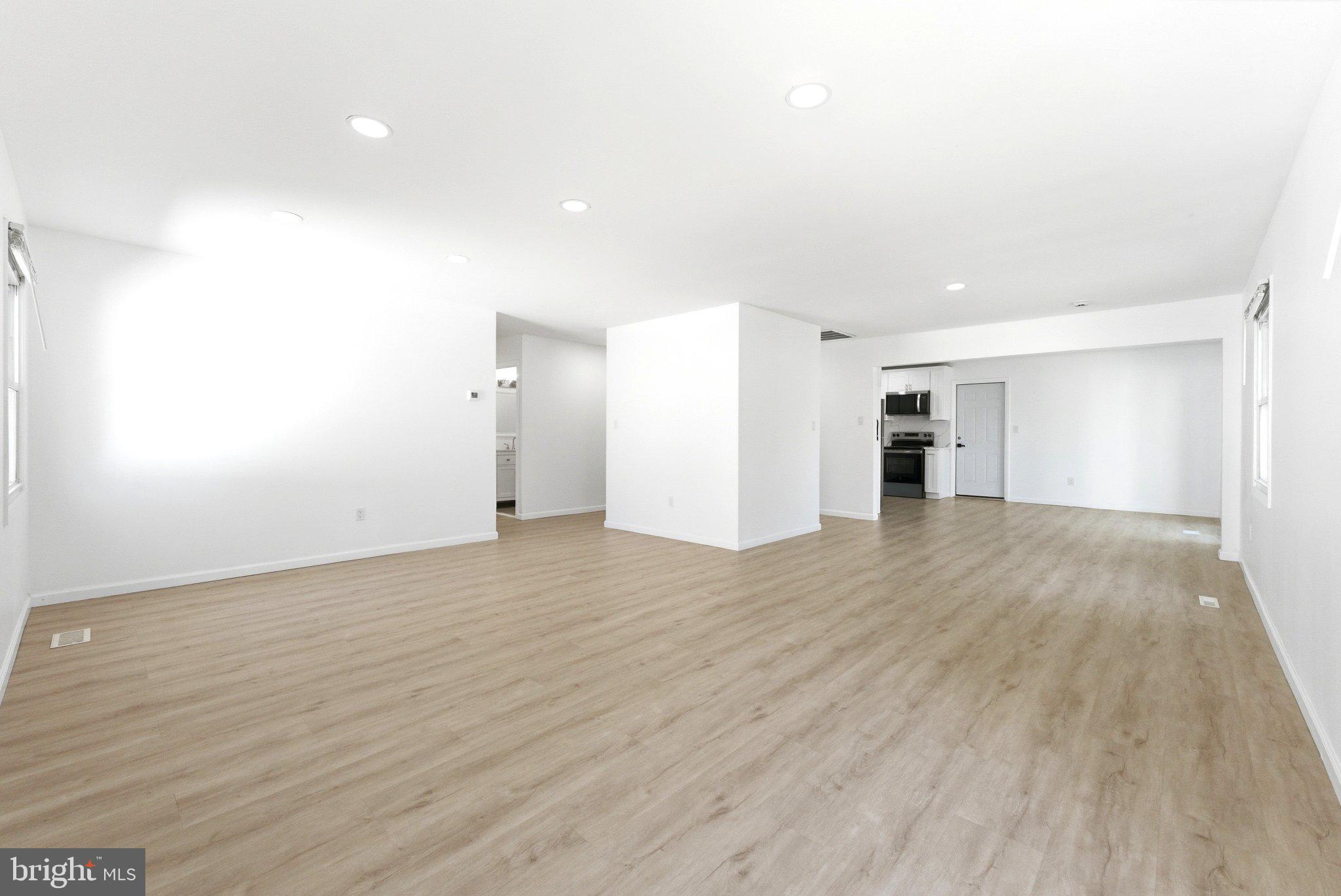 49 Middleton Lane Willingboro, NJ 08046 - Photo 4 of 23 a view of empty room with wooden floor