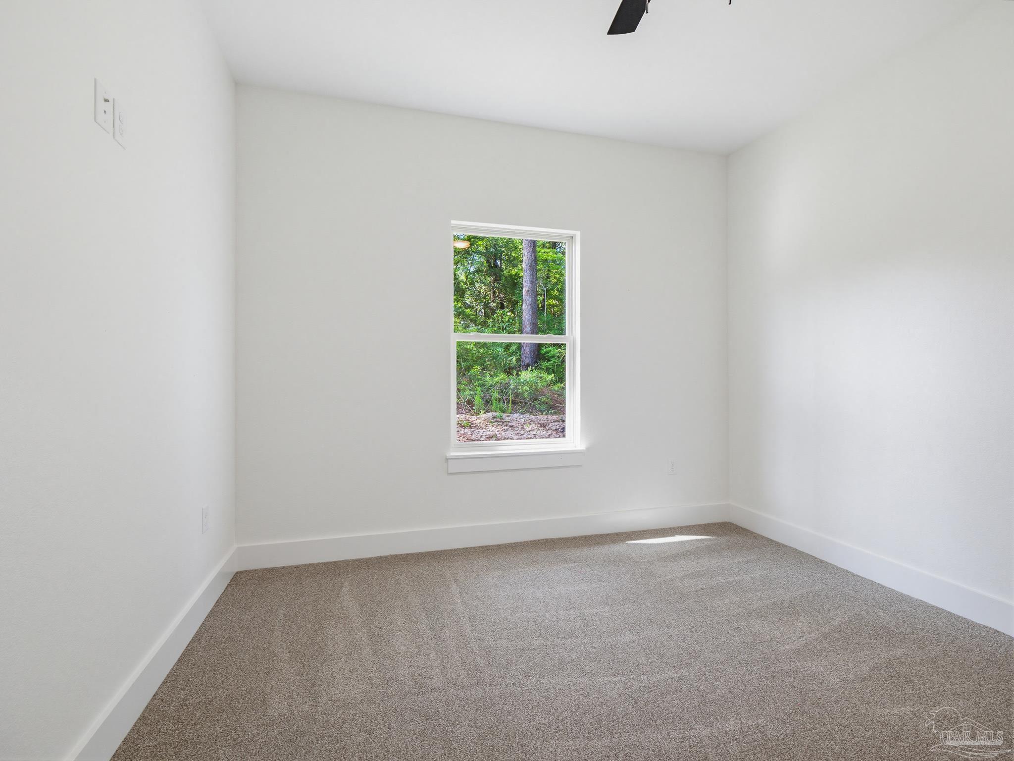 5724 Riviera Drive Milton, FL 32583 - Photo 39 of 52 an empty room with a window