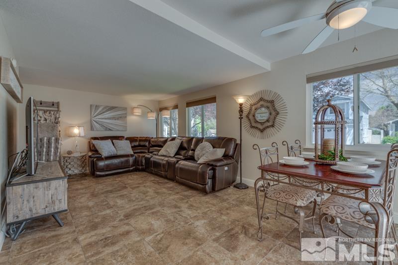 7575 Lighthouse Lane Reno, NV 89511 - Photo 11 of 40 a living room with furniture and a large window